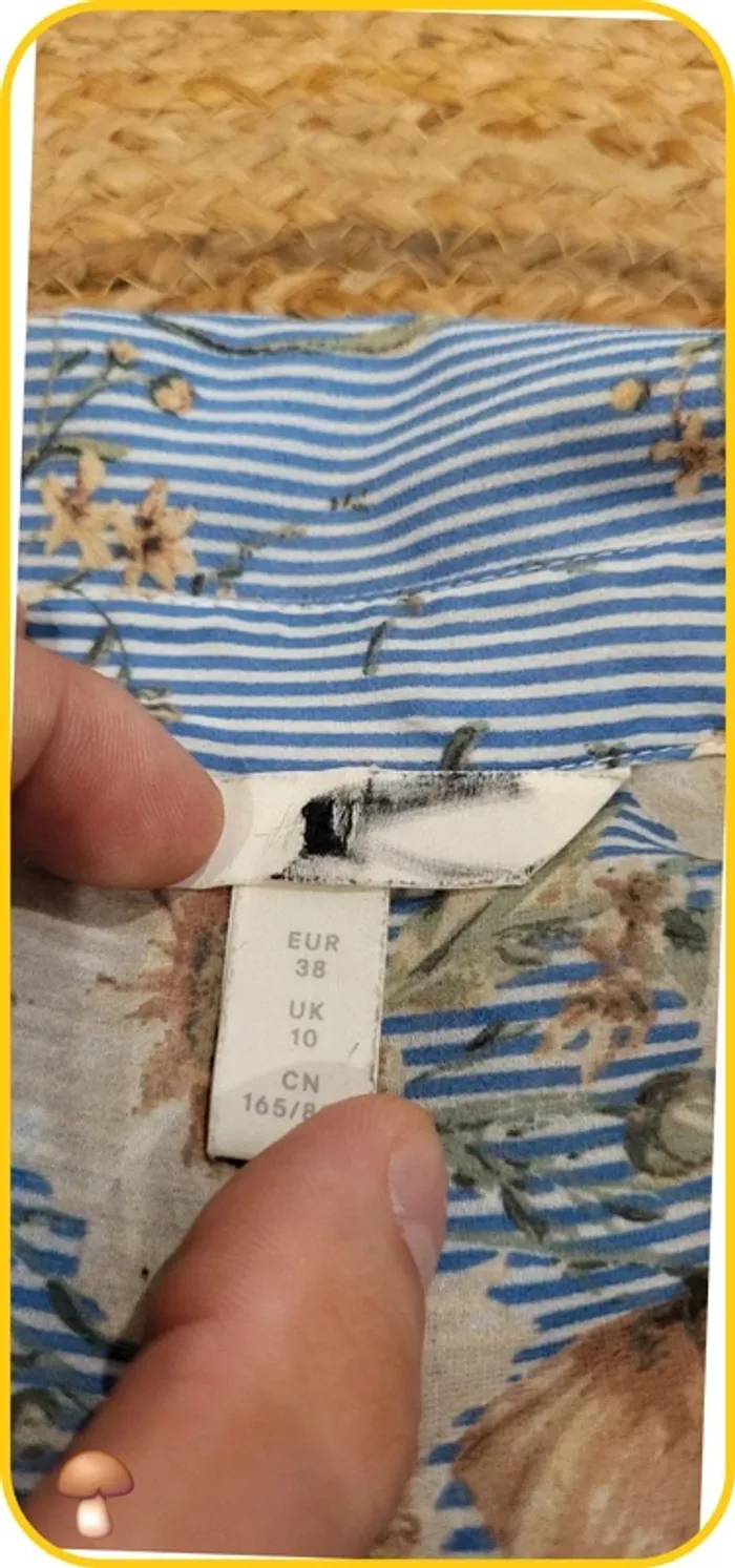 Chemisier sans manches fleuri H&M - Taille 38 - Bleu clair - Très bon état - photo numéro 6