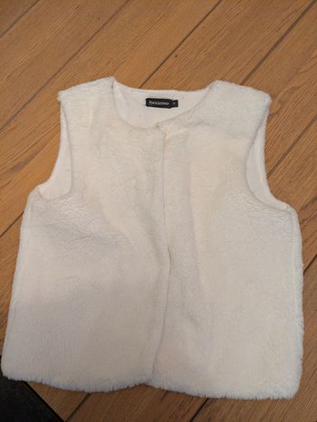 Gilet sans manche fourrure blanche