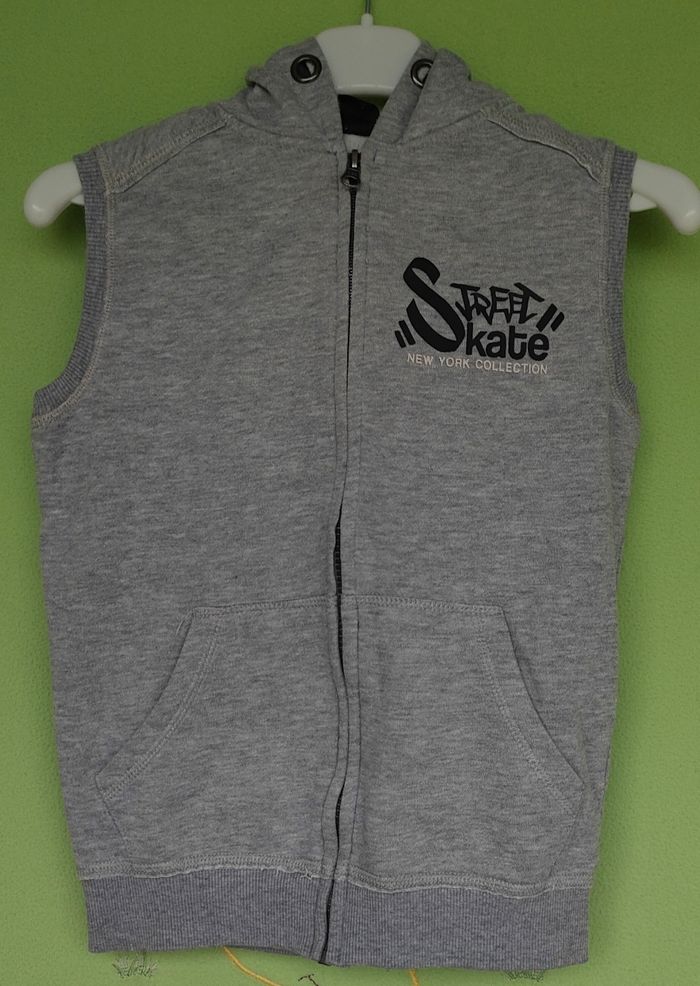 Veste SM à capuche taille 10 ans