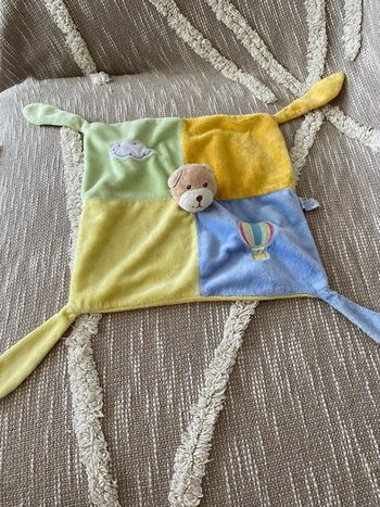 Peluche doudou plat 26cm gispy jaune bleu vert et orange très bon état
