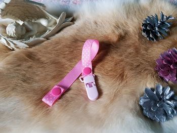 Attache tétine neuve rose