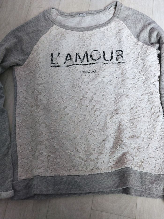 Pull taille s
