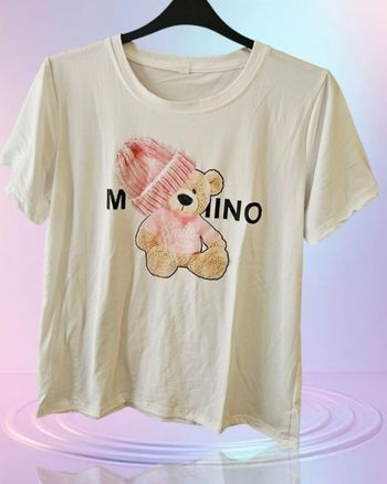 Magnifique Tee-Shirt " Moschino " neuf 
Taille L