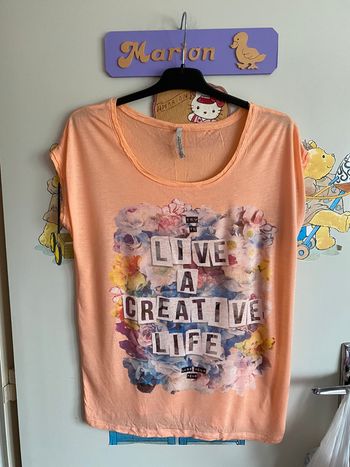 Tee shirt à manches courtes à motifs, taille S, marque Stadivarius.