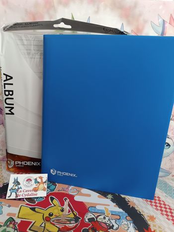 PHOENIX SHIELD - Album bleu - 396 places - NEUF