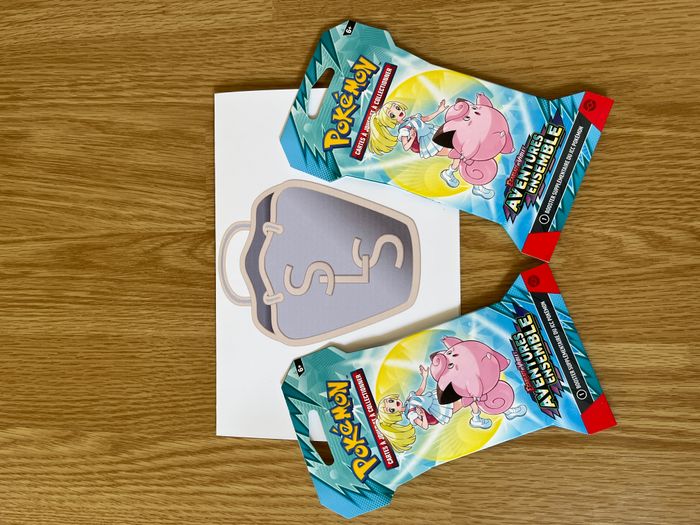 Lot de 2 Boosters Pokémon, Aventures ensemble EV09, en français sous blister.