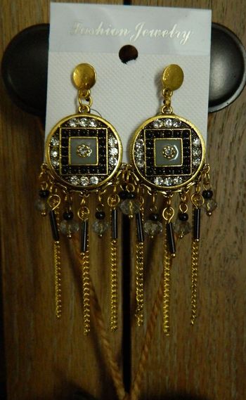 Boucles d'oreilles longues neuves