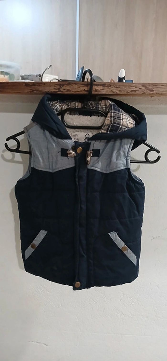 Veste sans manches 4/5 ans