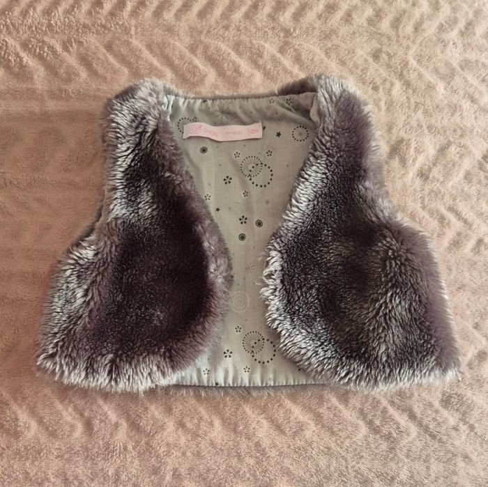 Veste en fourrure grise