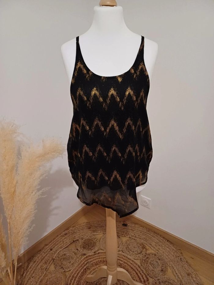 Top noir et doré asymétrique Tout feu tout femme taille M 38