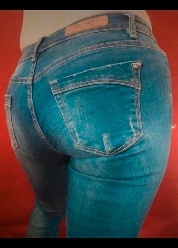 Jeans slip skinny troué taille basse M 38