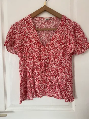 Top peplum fleuris