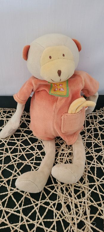 Doudou musical singe les Loustics orange MOULIN ROTY