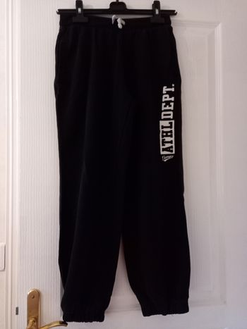 Pantalon de jogging noir marque Décathlon taille 14 ans
