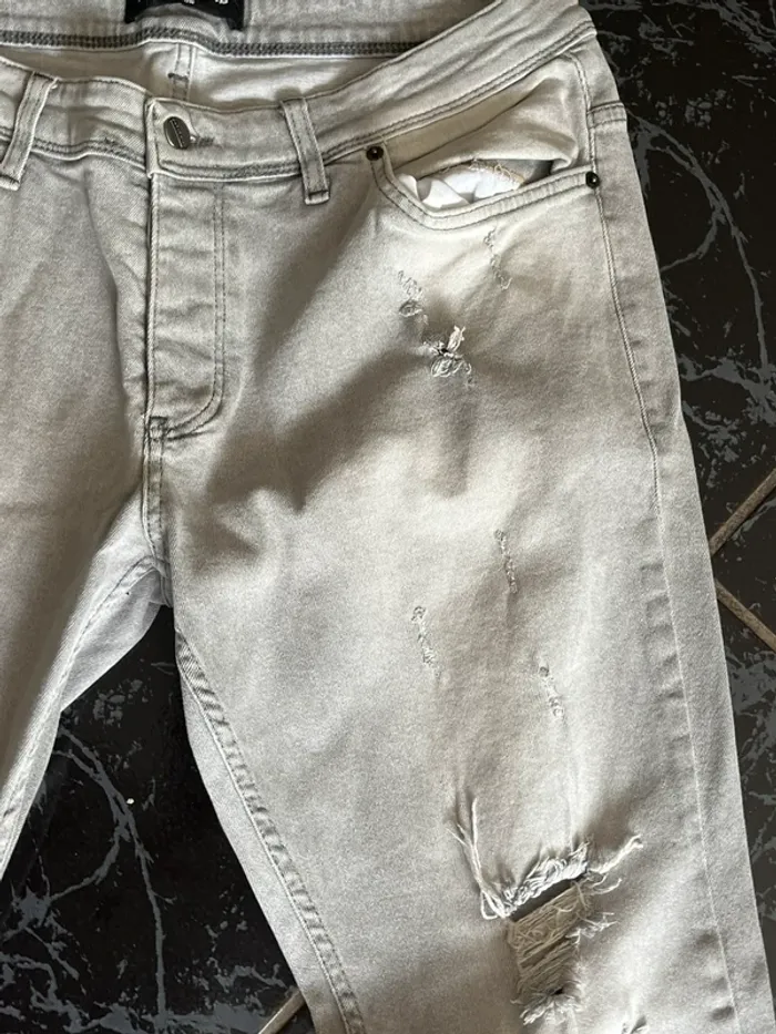 Jean gris troué slim L - photo numéro 4