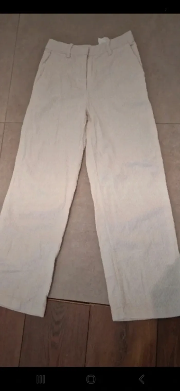 Pantalon beige bas large hm beige taille 36