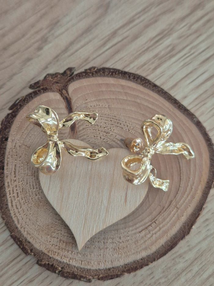 Jolie boucle d'oreilles nœud en acier - photo numéro 2