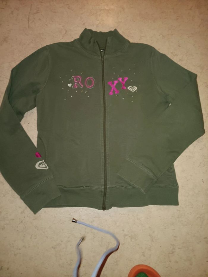 Gilet Roxy avec deco à plusieurs endroits t.16 ans