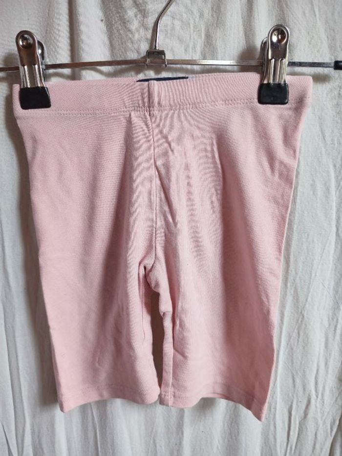Cycliste rose pâle