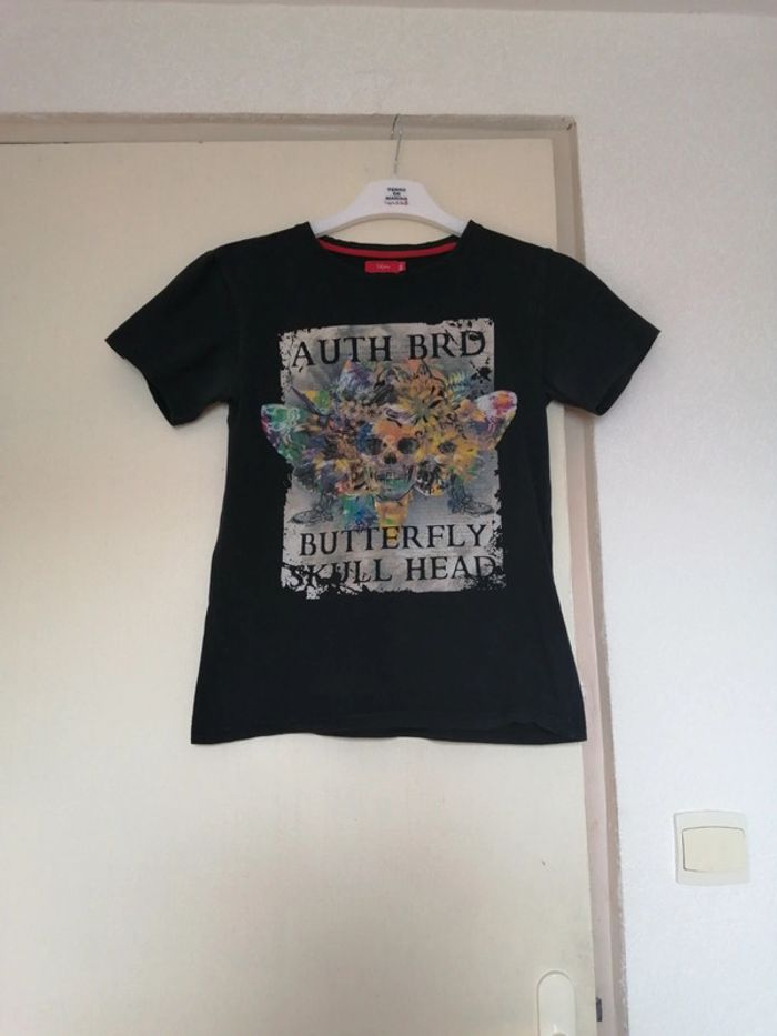 Tee shirt 14 an couleur noir avec multicolore.