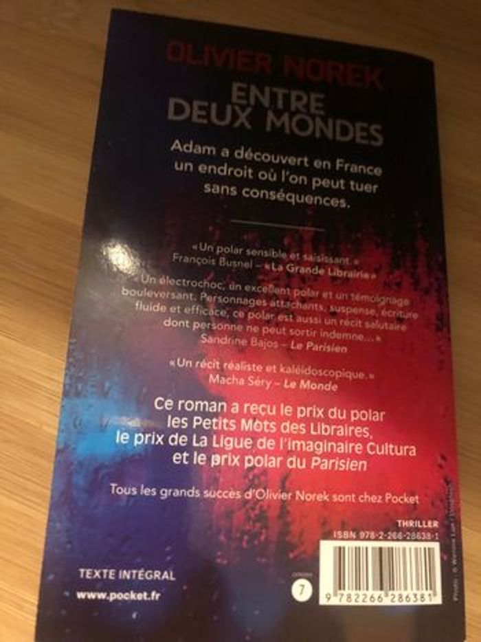 Livre Olivier Norek Entre deux mondes - photo numéro 2