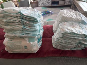 71 couches Pampers non emballées