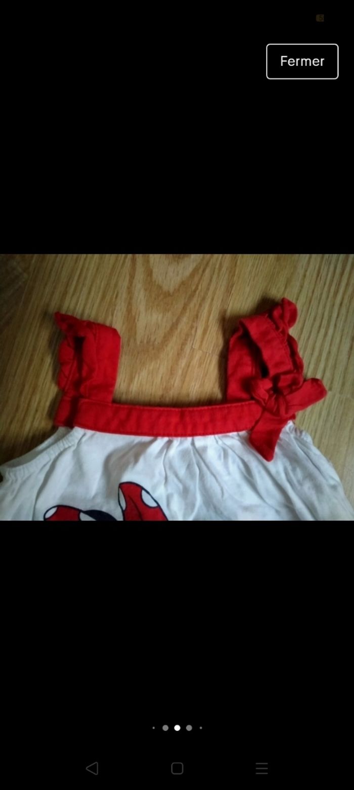 Débardeur blanc bretelles rouges. Disney Baby.
Taille 18 mois - photo numéro 4