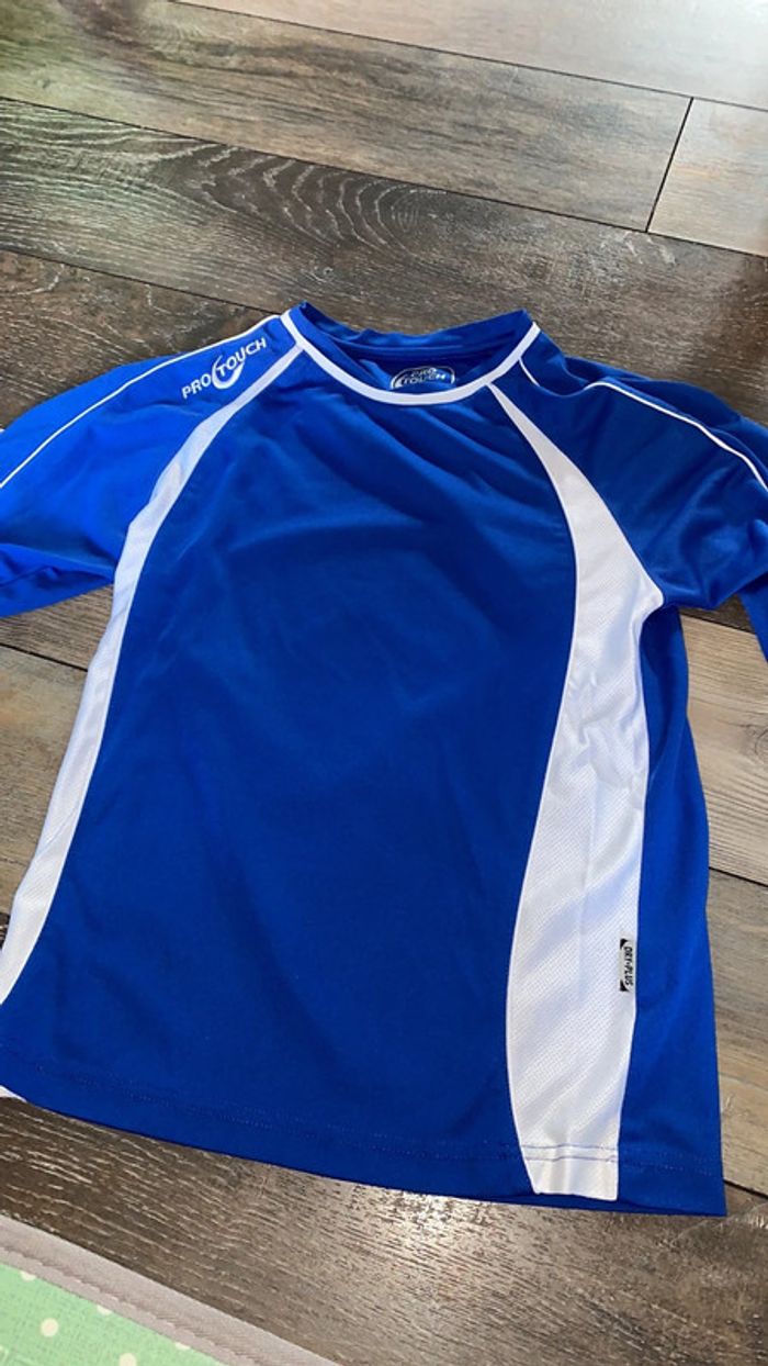 Pull manches longues bleu et blanc 8-10 ans