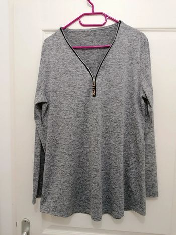 Pull léger porté une fois comme neuf