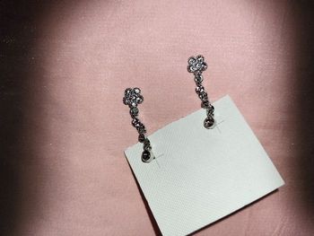 B oreilles pendanres