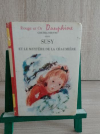 Susy et le mystère de la chaumière, rouge et or Dauphine