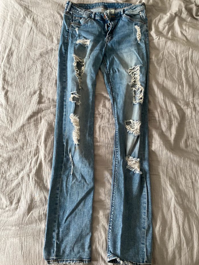 jean troué taille 42