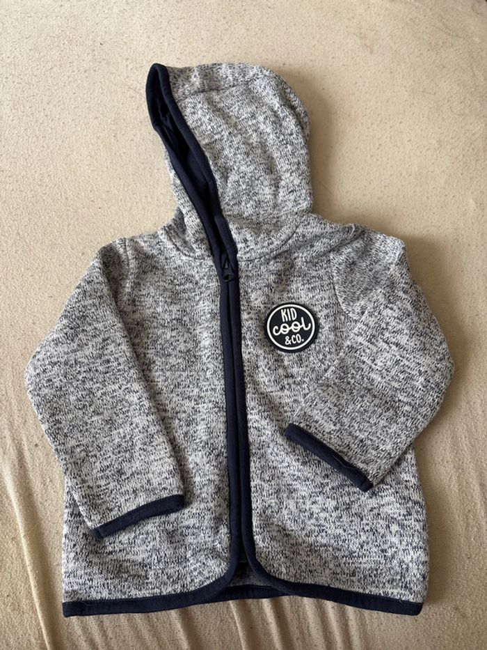 Gilet capuche