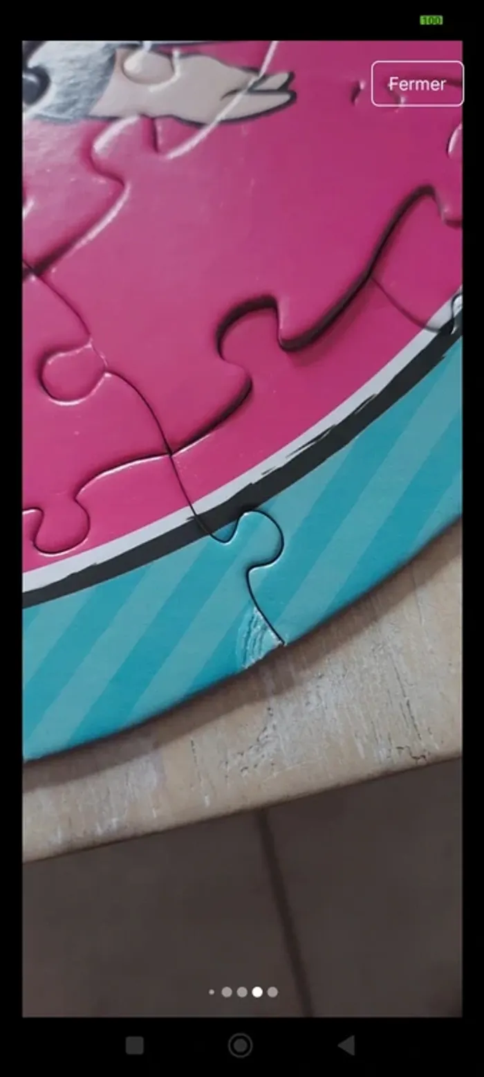 Puzzle LOL complet avec sa boîte de rangement en forme de boule - photo numéro 3
