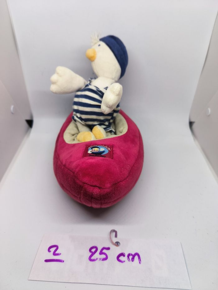 Peluche bateau musical