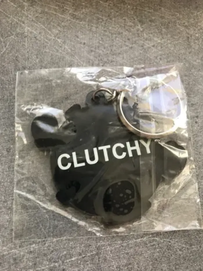 porte clé vert neuf toujours en sachet jamais utilisé - photo numéro 2