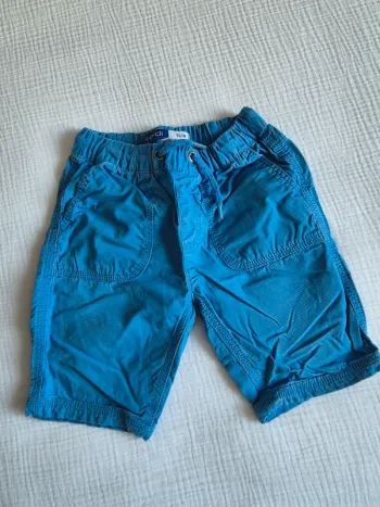 Short slim bleu Okaïdi garçon 6 ans