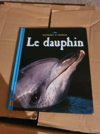 Livre histoire d'animaux : le dauphin