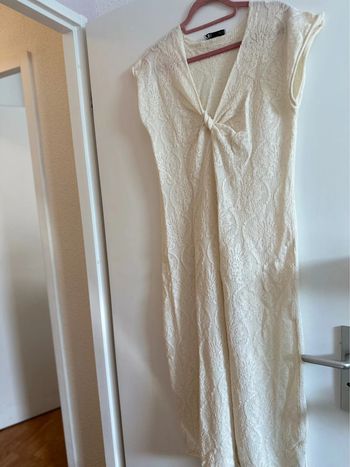 Robe en maille jacquard à noeud zara