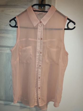 chemise sans manches rose transparent