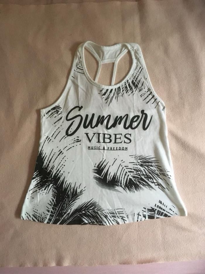 Débardeur Punkidz 8 ans (1€80)