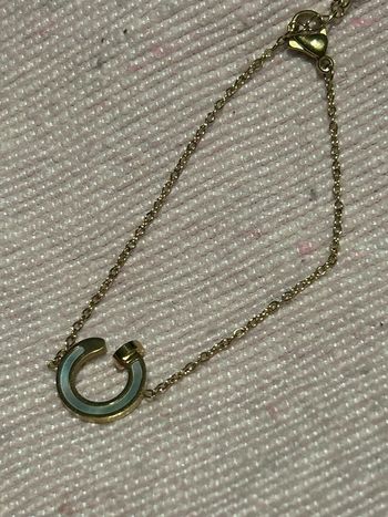 Bracelet doré en acier neuf