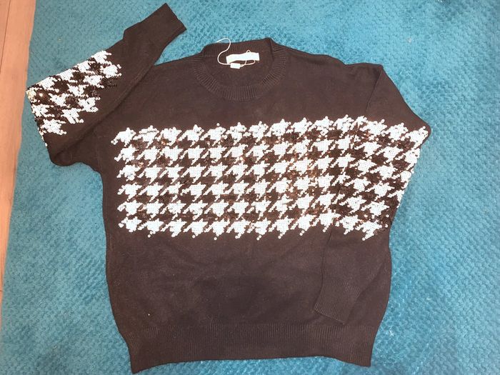 Pull style pied de poule