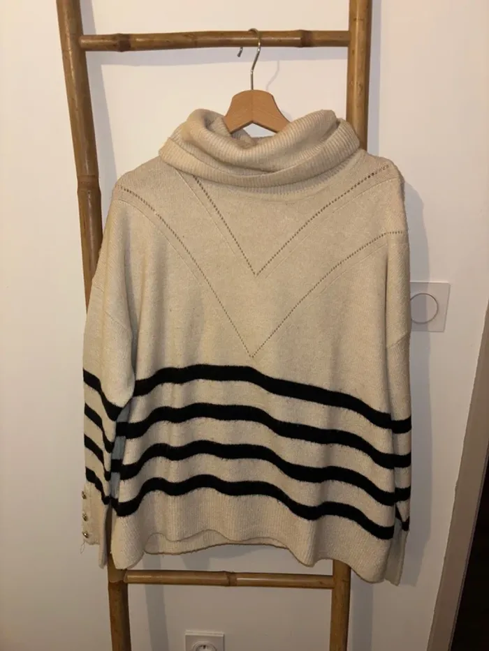 Pull col roulé