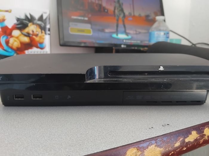 Ps4 slim custom plus une ps3 sans manette - photo numéro 5