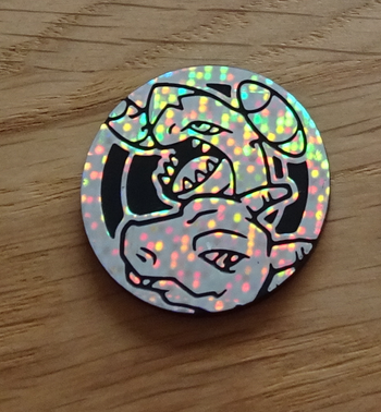 Jeton pokemon Carchacrok et Dracaufeu