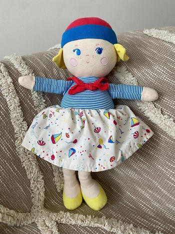 Peluche doudou 37cm corolle poupée fille blonde bleu rouge et jaune très bon état