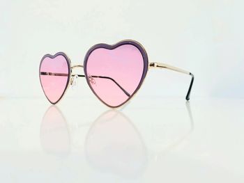 Lunette de soleil femme cœur violette et dorée UV protection catégorie 2