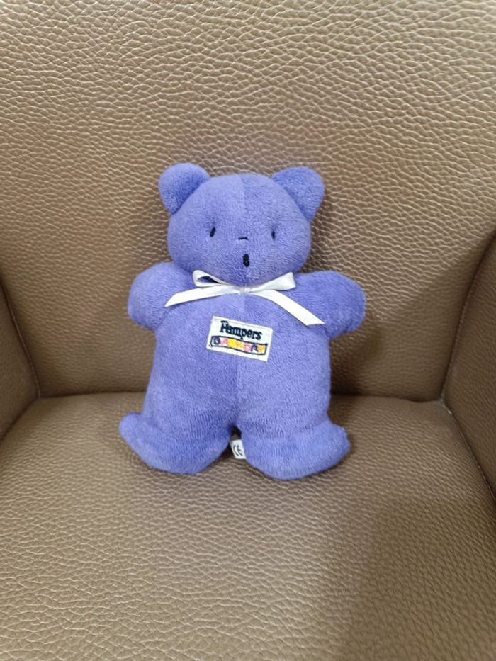 Doudou ourson pampers