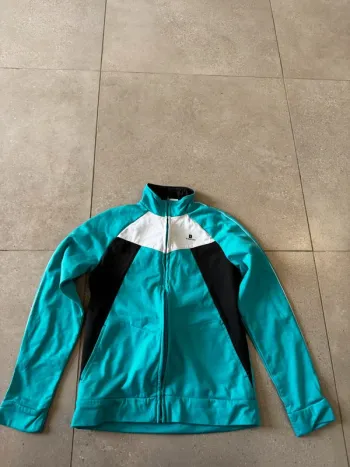 Gilet Domyos, taille 14 ans ,bon état